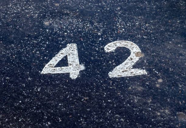 istock Numbers painted on concrete and asphalt surfaces 1303225626