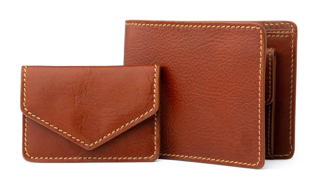 istock Brown shiny wallet isolated on white background 1303225643