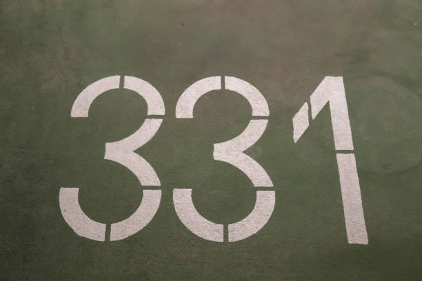 istock Numbers painted on concrete and asphalt surfaces 1303225651