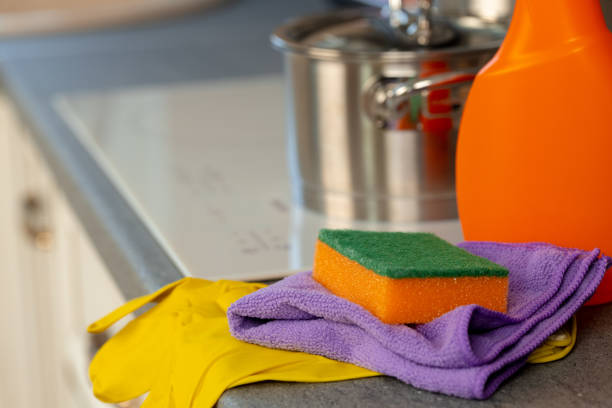 istock Cleaning detergents and tools on a kitchen counter 1303230234