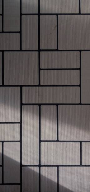 Square and rectangle Wallpaper that is illuminated by the reflection of the sun joule stock pictures, royalty-free photos & images
