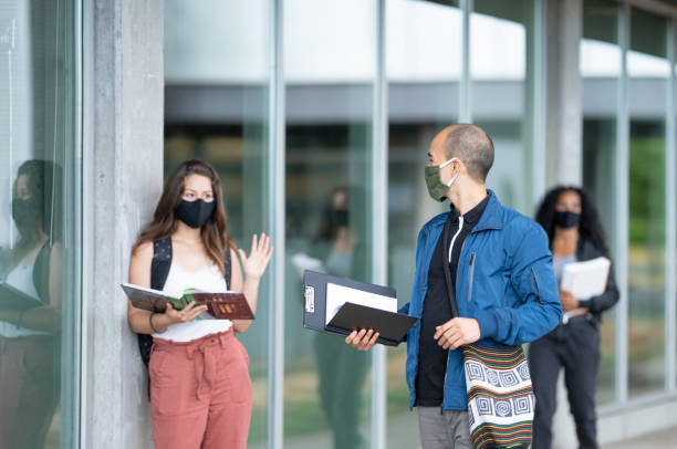 istock Wearing a mask on campus to keep everyone safe 1303237200