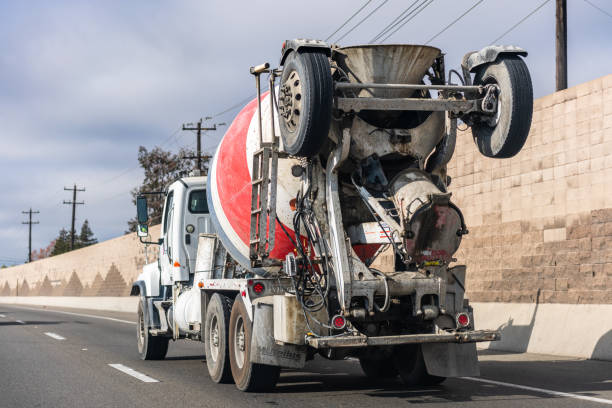 cemex mixer truck transporting cement to the construction site - truck motion road cement truck imagens e fotografias de stock