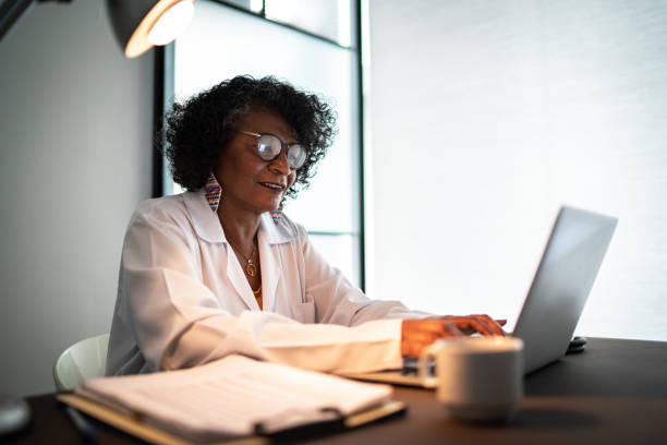 istock Doctor using laptop or doing a telemedicine call with patient 1303238874