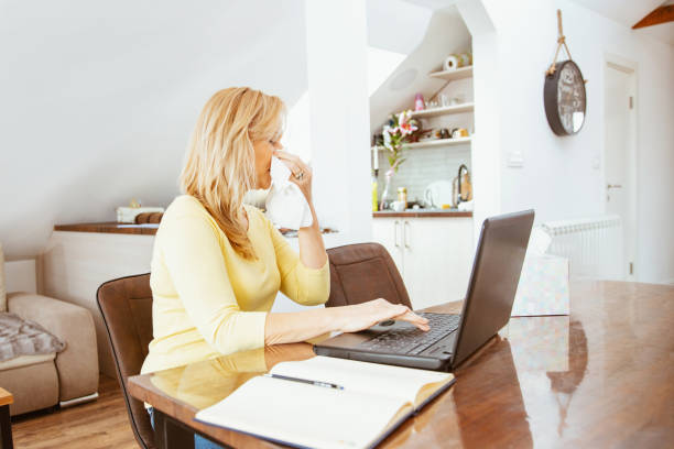 istock Business woman has problems due to seasonal allergies 1303245018