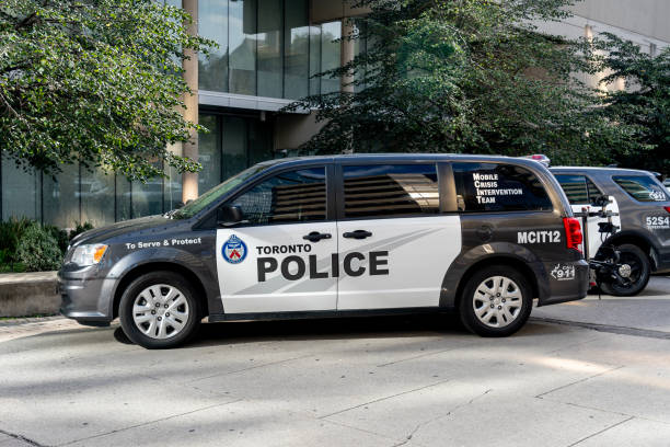 Toronto police cars are seen at the Police station in downtown Toronto, Canada. Toronto, Canada - September 29, 2020: Toronto police cars are seen at the Police station in downtown Toronto, Canada. police station canada stock pictures, royalty-free photos & images