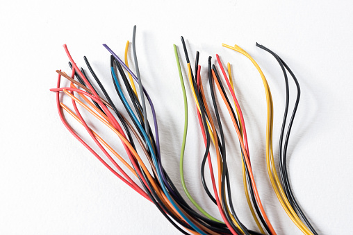 Mixture Of Multicolored Cables On White Background.