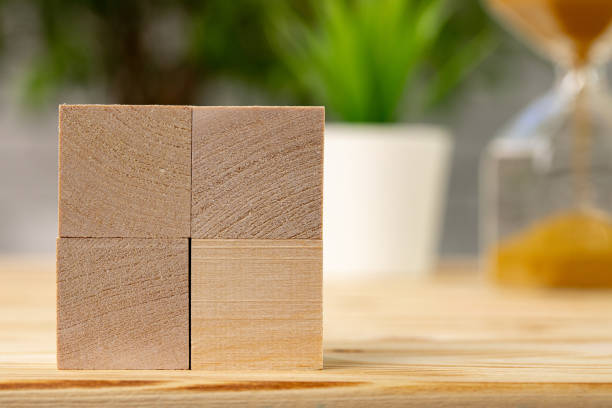istock Blank wooden cubes with copy space for your design on office working table 1303253726