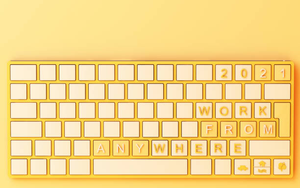 istock Computer keyboard with yellow work from home text on yellow background - covid-19 concept 3d rendering 1303256402