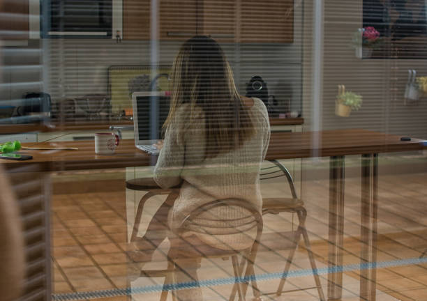Woman Teleworking At Home. Successful Woman Working At Home. Young Woman And Businesswoman Working At Home With Her Laptop