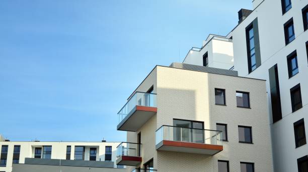 istock Modern apartment buildings on a sunny day with a blue sky. 1303268598