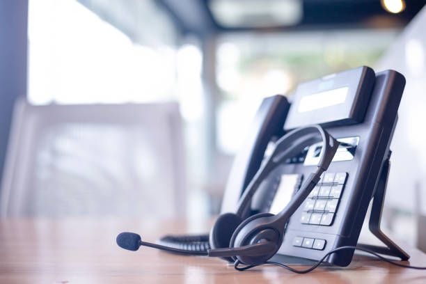 istock Communication support, call center and customer service help desk. VOIP headset for customer service support (call center) concept 1303271656