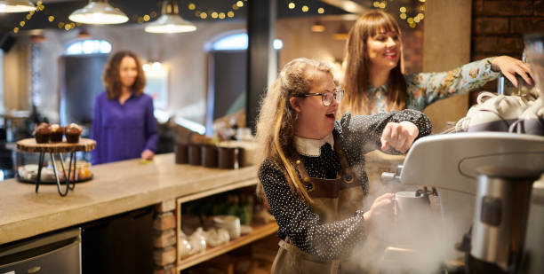 istock young female barista 1303277372