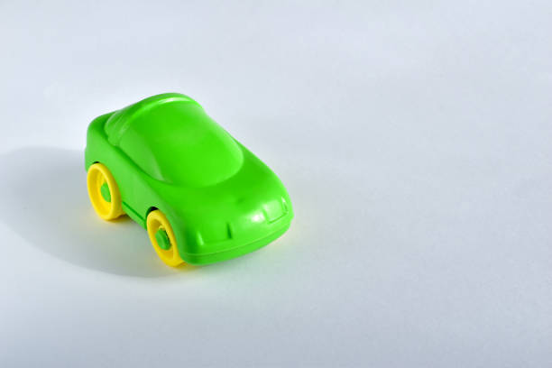 istock Green car. Toy for children. Plastic. 1303280726