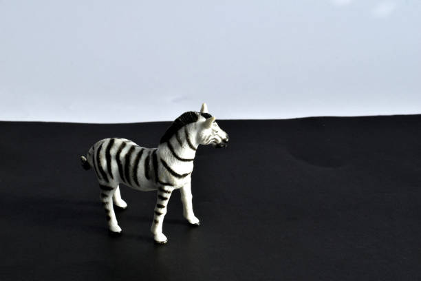 istock Children's toy. Zebra. Made of plastic. Side view. 1303281757