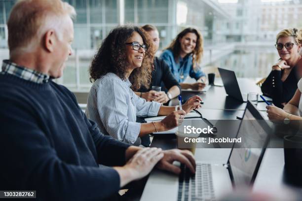 Multiracial Business People Having Meeting Stock Photo - Download Image Now - Meeting, Board Room, Manager