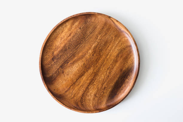 istock Wooden plate top view on white background 1303284681