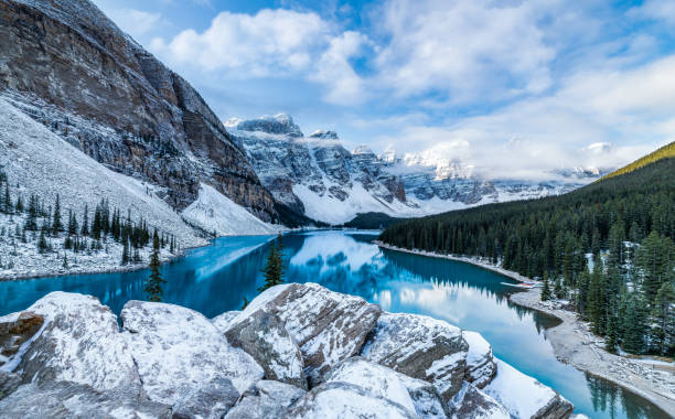 Moraine Lake vibe Early morning vibes at Moraine Lake canadian rockies stock pictures, royalty-free photos & images