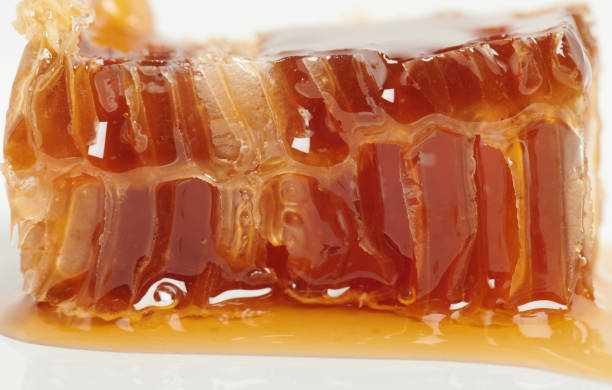 istock Piece of gold color honey 1303285016
