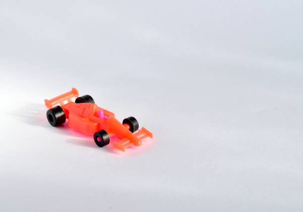 istock Children's toy. Red racing car. Plastic. 1303285701