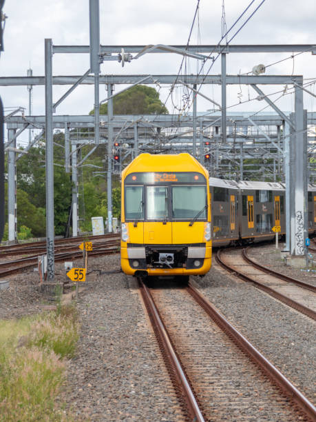 istock Commuter train approaching train station in Sydney NSW Australia 1303285853