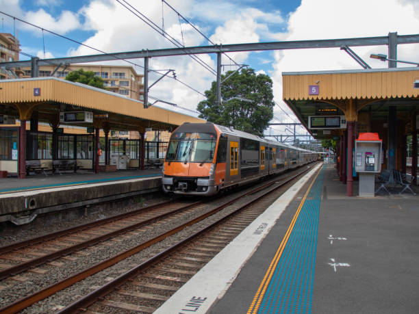 istock Commuter train approaching train station in Sydney NSW Australia 1303285855