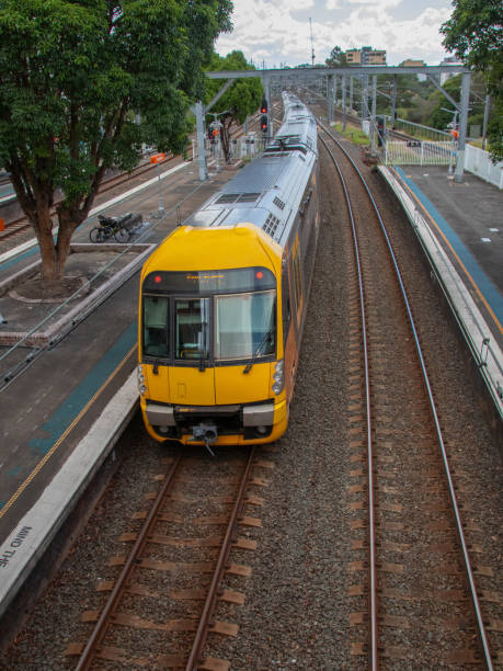 istock Commuter train approaching train station in Sydney NSW Australia 1303285866