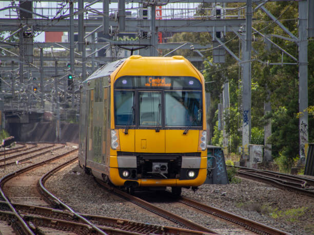 istock Commuter train approaching train station in Sydney NSW Australia 1303285883