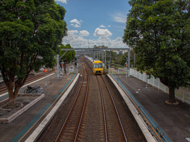 istock Commuter train approaching train station in Sydney NSW Australia 1303285896