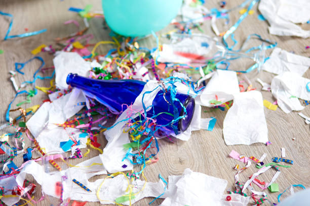 istock Top view of floor with after a party celebration with empty blue bottles 1303289076