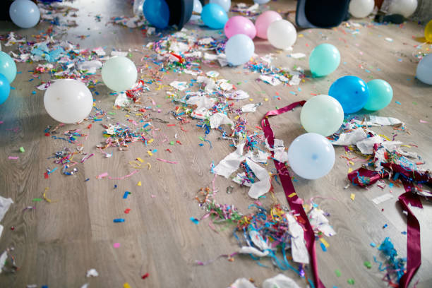 istock Top view of floor with after a party celebration with empty blue bottles 1303289089
