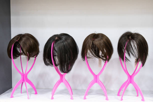 Wig with various hair length and style on display for cancer patient under going chemotherapy