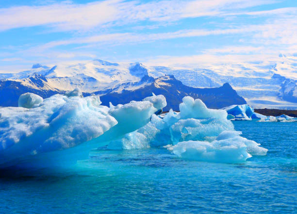 Icebergs snow blue ice floes in Arctic ocean. Incredible winter white landscape, purity, shine, sparkling glacier water. North cold weather in polar regions. Ice floes arctic ocean photos stock pictures, royalty-free photos & images