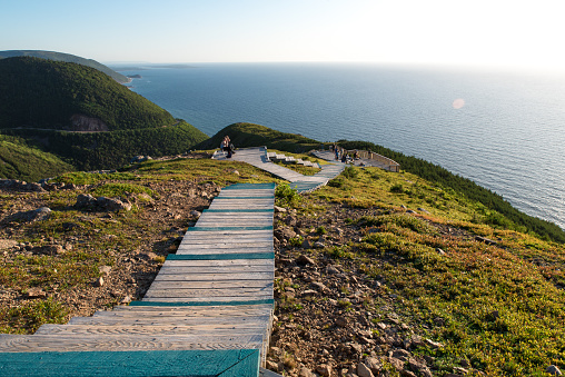 Hiking the scenic Skyline Trail, Cabot Trail at Cape Breton Highlands National Park, Nova Scotia, Canada. Boardwalk with wooden steps at headland