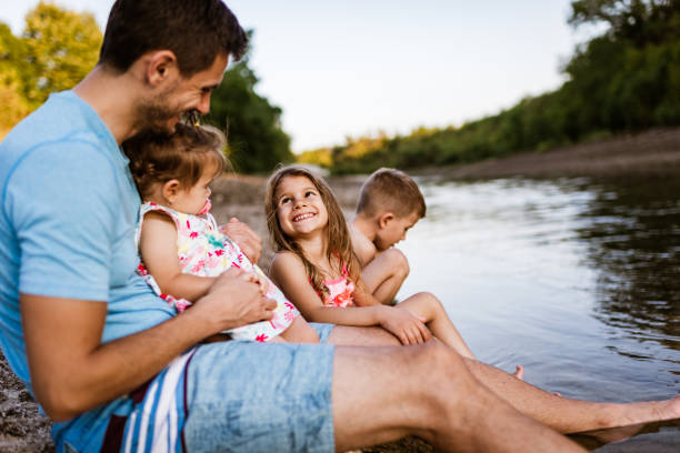 istock Family relaxation on the river 1303291718