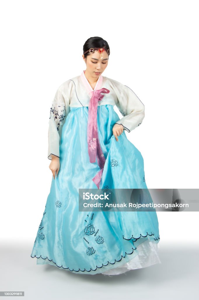 Korean Woman with Hanbok, the traditional Korean dress in white background isolated Hanbok Stock Photo