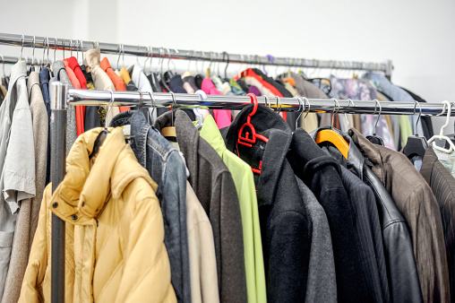 Different Used Clothes For Men And Women On A Rack In A Second Hand Shop Or  Thrift Store Stock Photo - Download Image Now - iStock