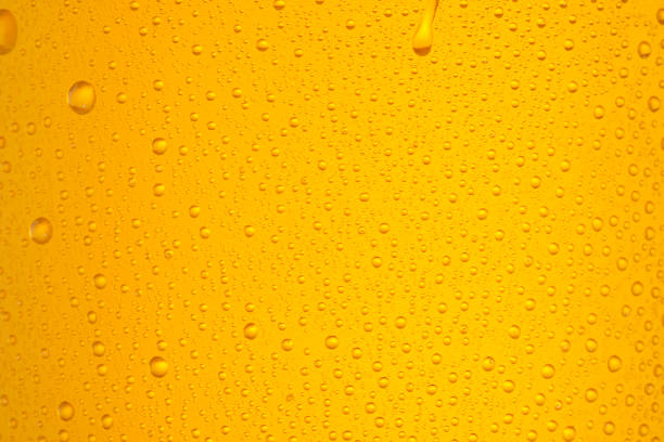 istock Beer Background. Ice Cold Beer Glass With Water Drops Condensation 1303293163