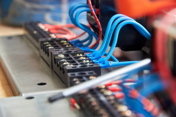 istock selective focus of wires connected to the contact bar installed on the control panel 1303293204