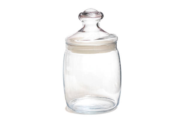 istock Decorative glass jar isolated on white background 1303293964