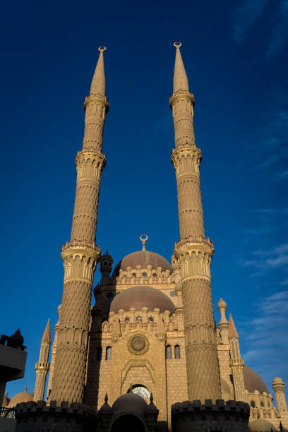 istock Beautiful large Islamic mosque at the sky background 1303298008