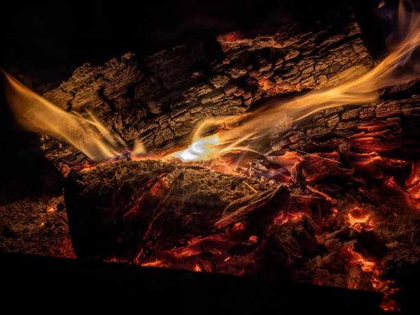 istock Burning billets in fireplace as abstract background 1303298857