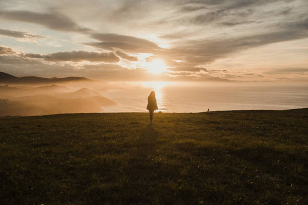 istock Young woman having fun by the sea 1303299199
