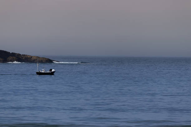 istock A small fishing boat at sea 1303302341