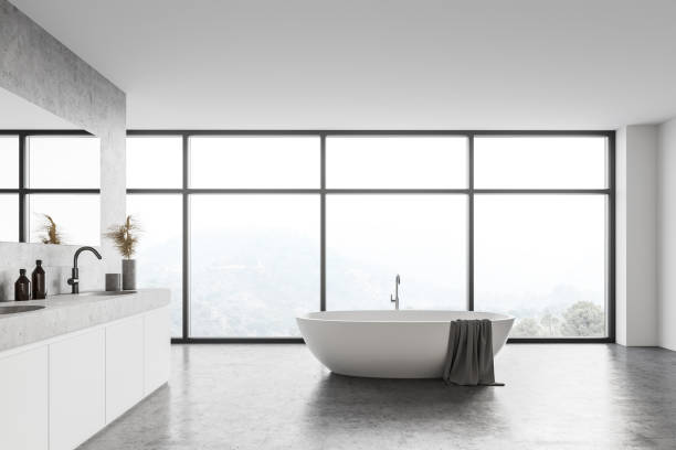 istock Panoramic white bathroom with sink and tub 1303303823