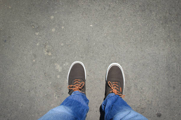 istock Top view from Young man with sneakers and jeans 1303304825