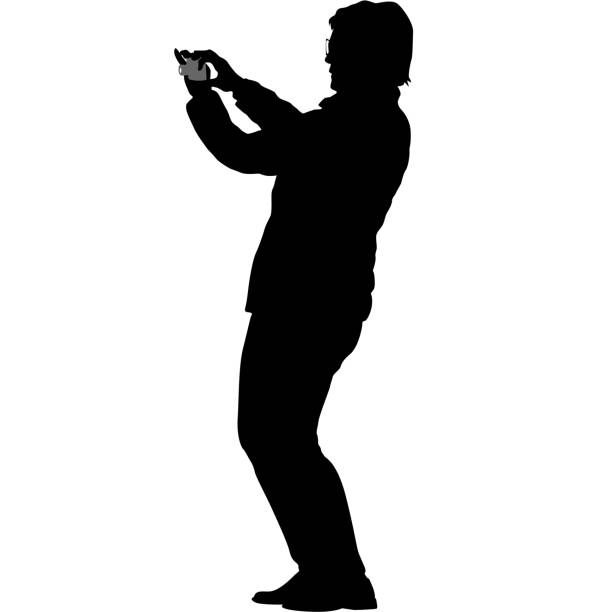 istock Silhouettes woman taking selfie with smartphone on white background 1303305936