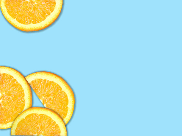Fresh Half Piece Orange on Blue Background