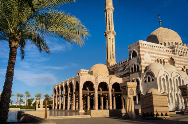 istock Beautiful large Islamic mosque at the sky background 1303311431