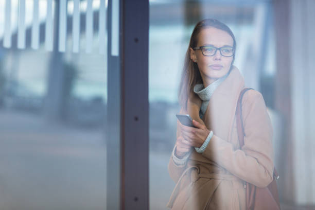 istock Young female passenger looking for her flight 1303313950